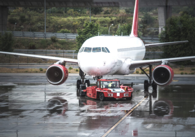 Plane at a airport terminal building